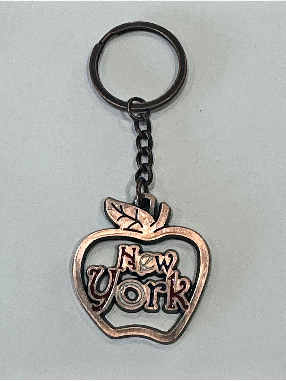 New York apple keychain in Rose Gold & Black
